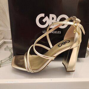 GBG Los Angeles Chloin Gold Heeled Sandals. NIB. Size 6
